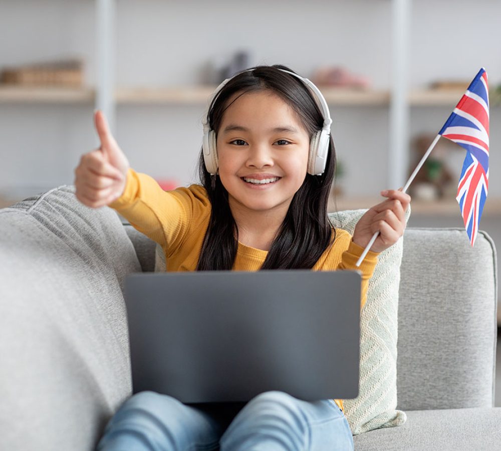 happy-chinese-teenager-girl-using-laptop-learning-2022-02-02-06-12-22-utc.jpg